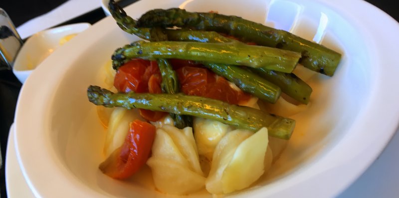 Etihad Business Class lunch - Orecchiette pasta with fresh cherry tomato ragout and melted bocconcini char grilled asparagus.