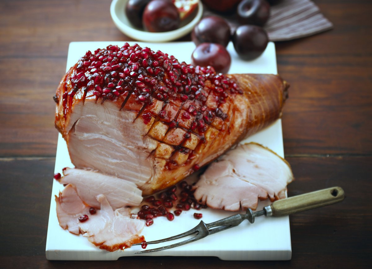Baked Ham with plum and pomegranate glaze-