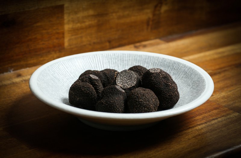 What you need to know about buying truffles in Australia - Black truffles in a bowl